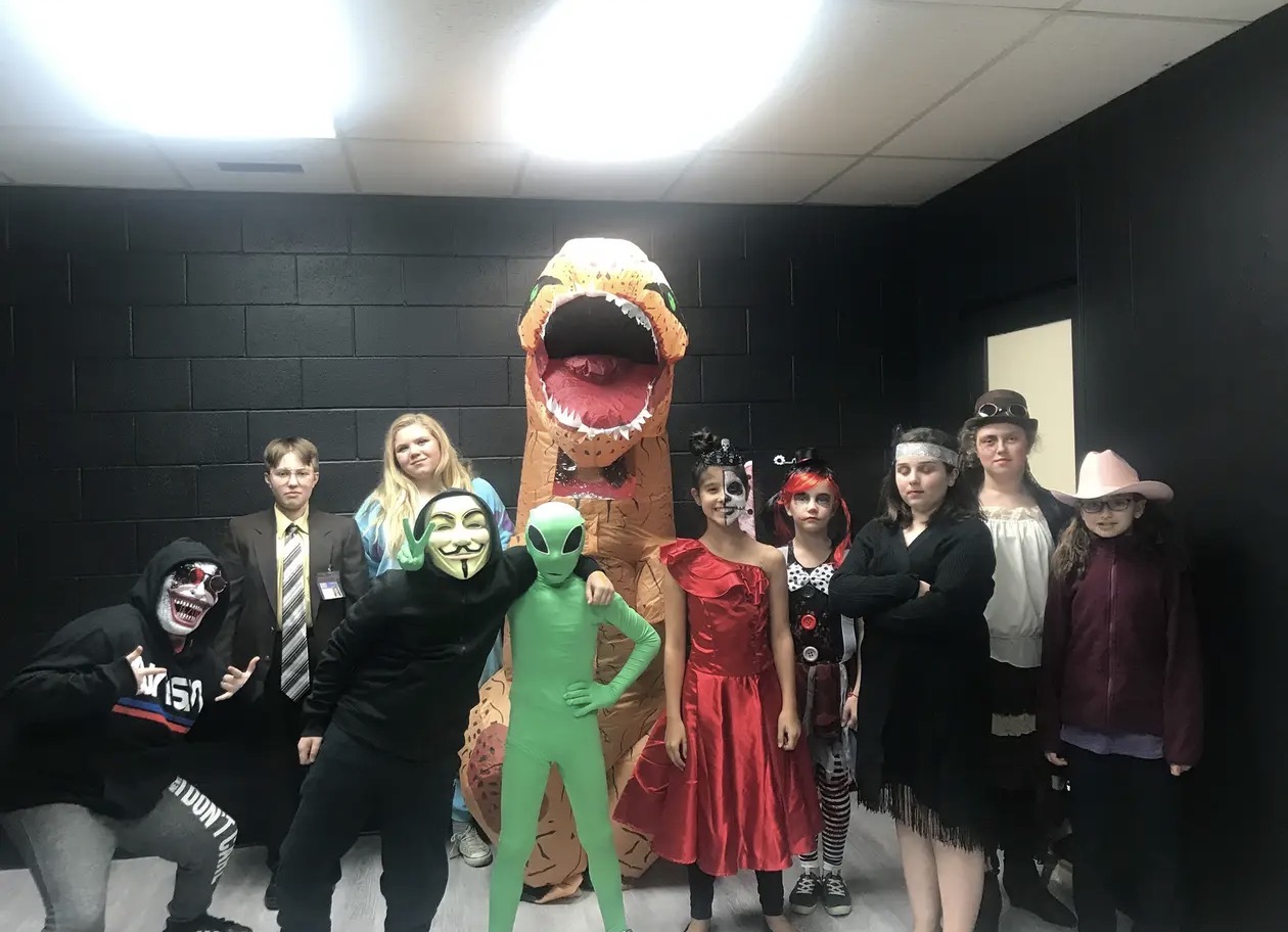 A group of young acting students in costumes at Rae-Ann's acting studio